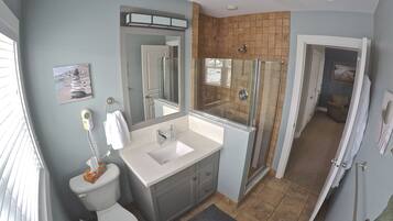 Combined shower/tub, hair dryer, towels, soap