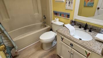 Combined shower/bathtub, hair dryer, towels, soap