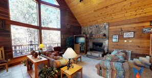 Televisio, takka, DVD-soitin, stereot