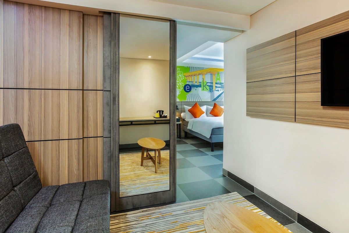 Family Room, 1 Queen Bed with Sofa bed | In-room safe, desk, soundproofing, iron/ironing board