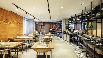 Lunch, dinner served; local and international cuisine, pool views