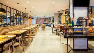 Lunch, dinner served; local and international cuisine, pool views