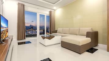 Apartment, 2 Bedrooms | Living room | Flat-screen TV