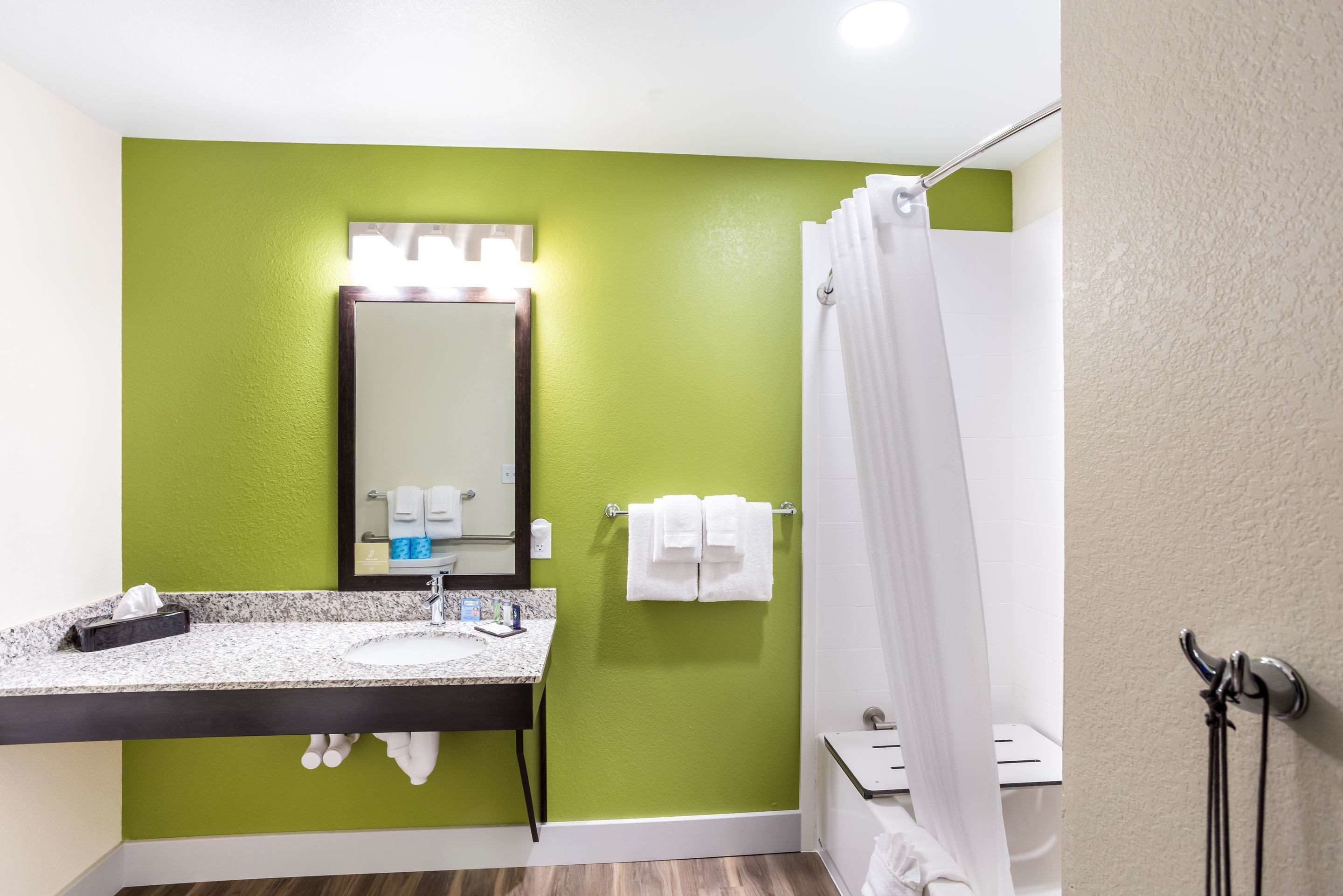 rainfall showerhead, hair dryer, towels, soap