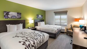 A hotel room with two beds, a desk, a chair, and artwork on the walls. - Sleep Inn Logan Ohio-Hocking Hills (Logan)