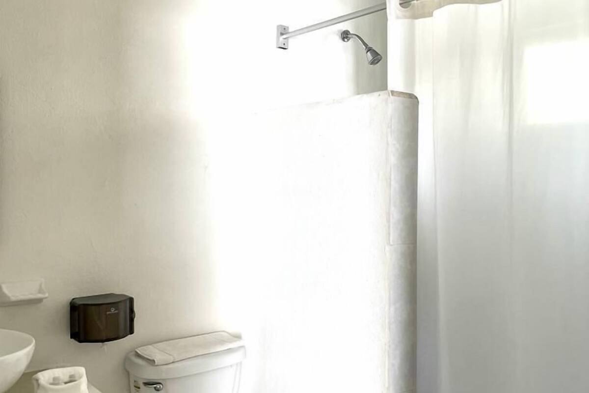 basic quadruple room, 2 double beds | 1 bedroom, minibar, blackout curtains, iron/ironing board