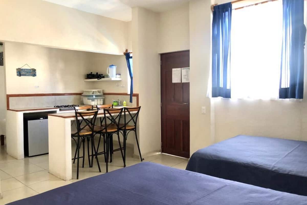 family bungalow, kitchen | 1 bedroom, minibar, blackout curtains, iron/ironing board