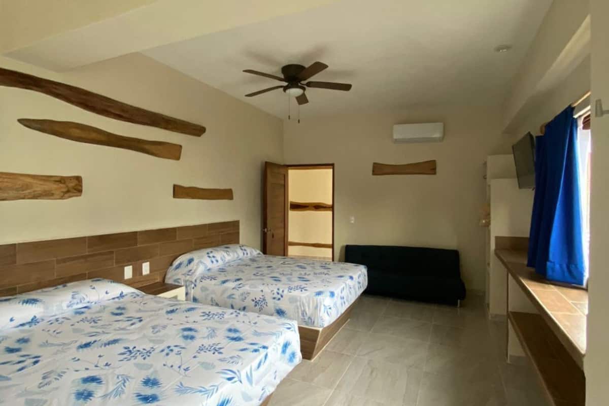 comfort suite, multiple beds | 1 bedroom, minibar, blackout curtains, iron/ironing board