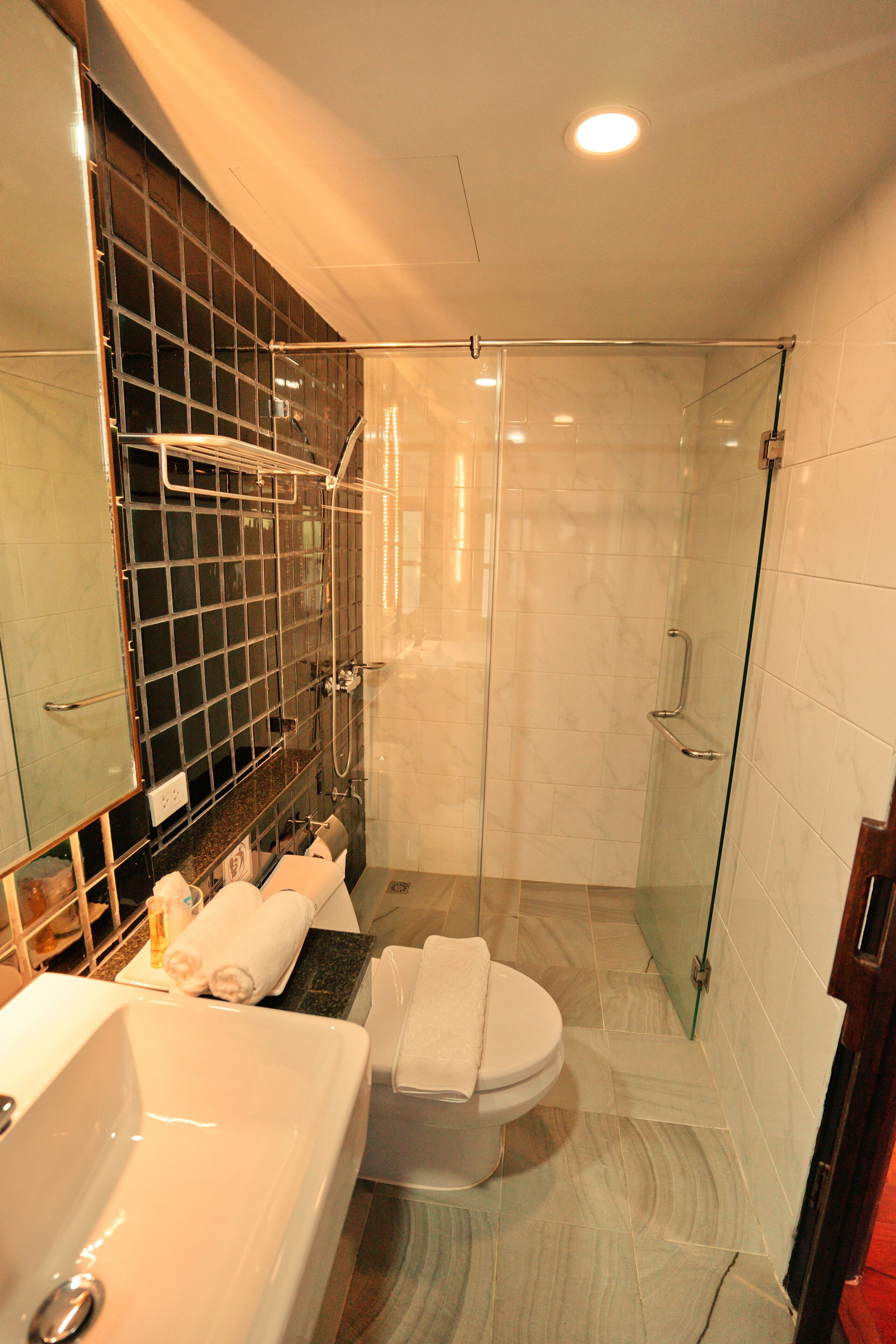 deep-soaking bathtub, free toiletries, hair dryer, slippers