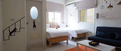 Desk, blackout curtains, free WiFi, bed sheets