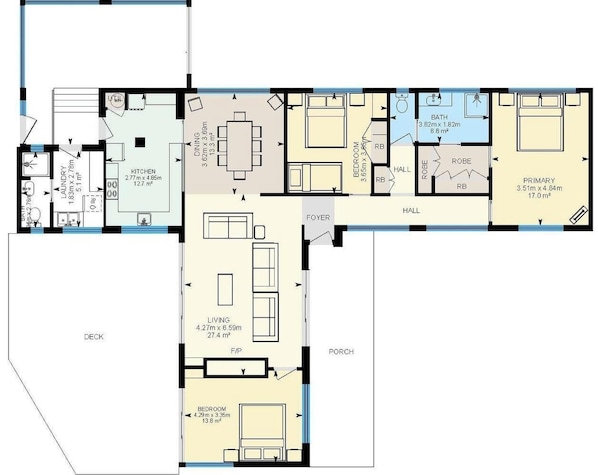 Un plan d’étage comprenant une cuisine, un coin repas, un salon, une chambre, une salle de bain, un hall d’entrée et une terrasse.