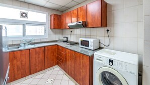 One Bedroom Apartment, King Bed | Private kitchen - Ruwi Hotel Apartments (Sharjah)