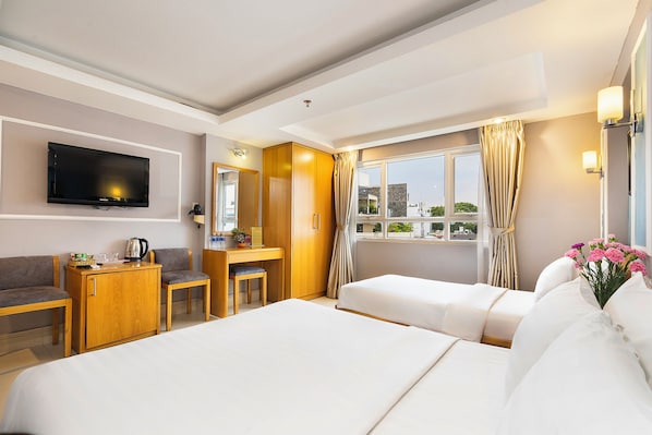 Suite de lujo, vista a la ciudad | Ropa de cama de alta calidad y minibar