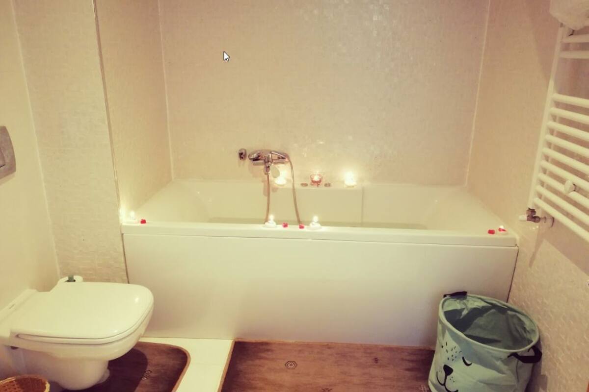 apartment, 1 bedroom, non smoking | bathroom | bathtub, jetted bath, free toiletries, hair dryer