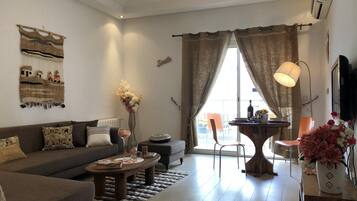 Appartement | Coin séjour | Télévisions à écran plasma