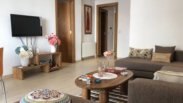 Appartement | Salle de séjour | Télévisions à écran plasma