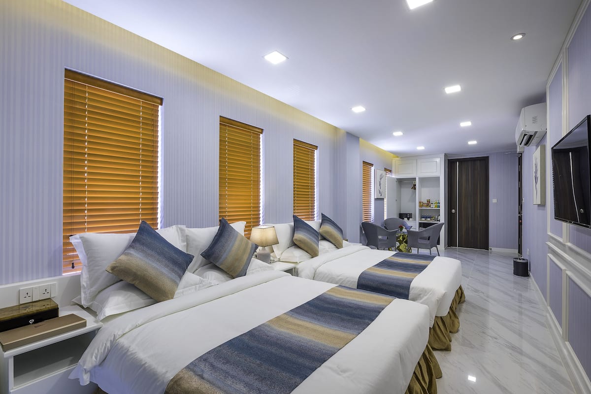 Familiekamer, 2 queensize bedden | Kameruitzicht