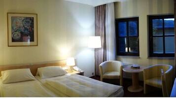 Een kluis op de kamer, extra bedden, gratis wifi, beddengoed