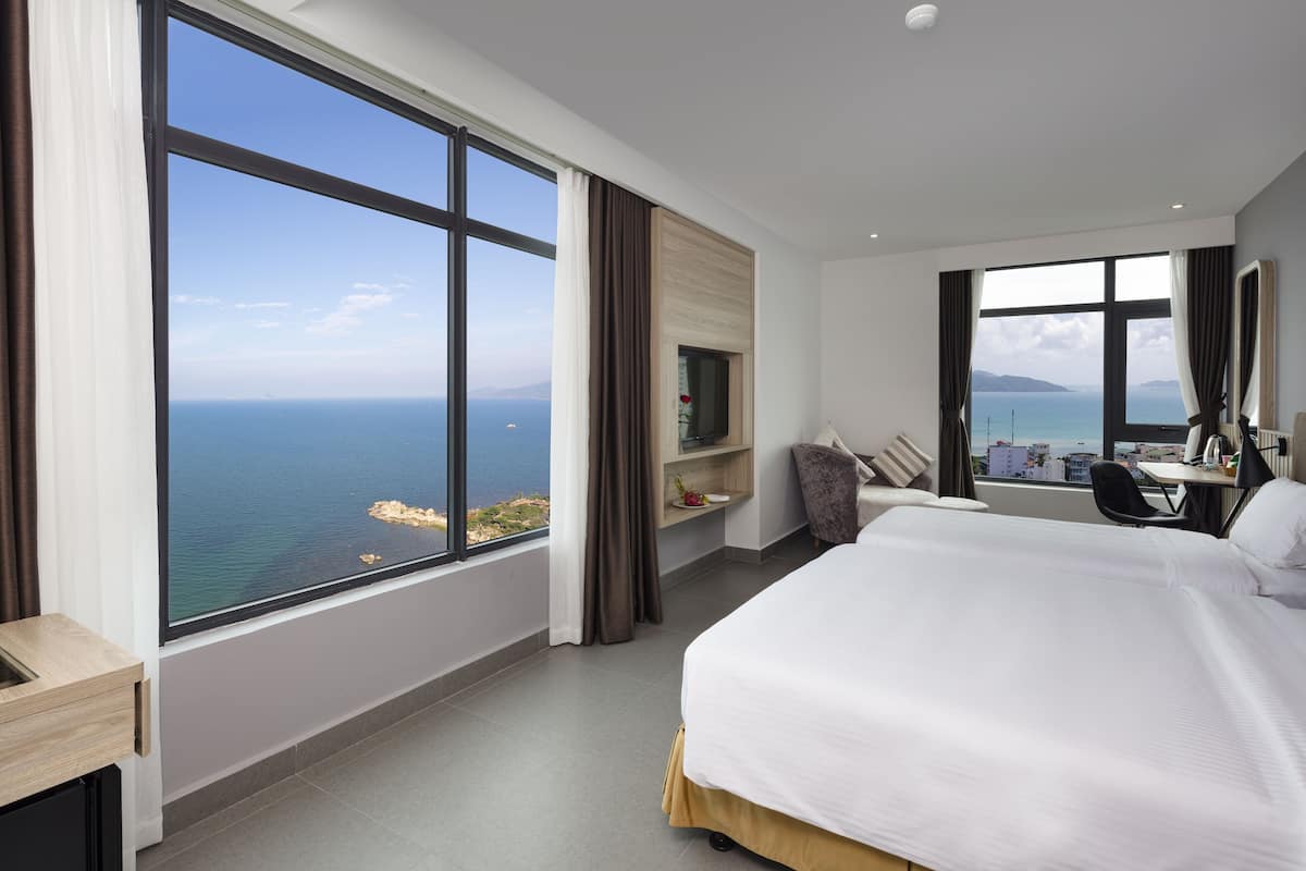 Quarto premium, vista para o mar | 1 quarto, roupas de cama premium, camas com colchões pillow-top