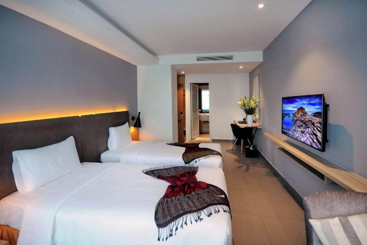 Luxe beddengoed, pillowtop-bedden, een minibar, een kluis op de kamer