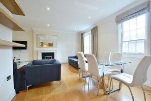Apartamento urbano, várias camas, para não fumantes, vista para a cidade | Sala de estar