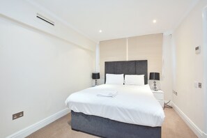 Apartamento urbano, várias camas, para não fumantes, vista para a cidade | 3 quartos, ferros/tábuas de passar roupa, Wi-Fi de cortesia