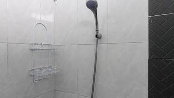 Double Room | Bathroom | Shower, free toiletries, towels