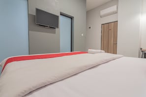 Habitación Deluxe | Escritorio, wifi gratis y ropa de cama