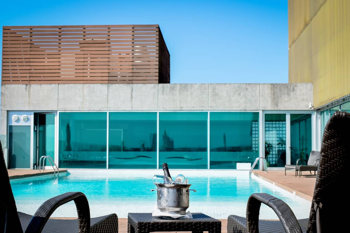 indoor pool, outdoor pool, open 6:00 am to 10:00 pm, pool umbrellas