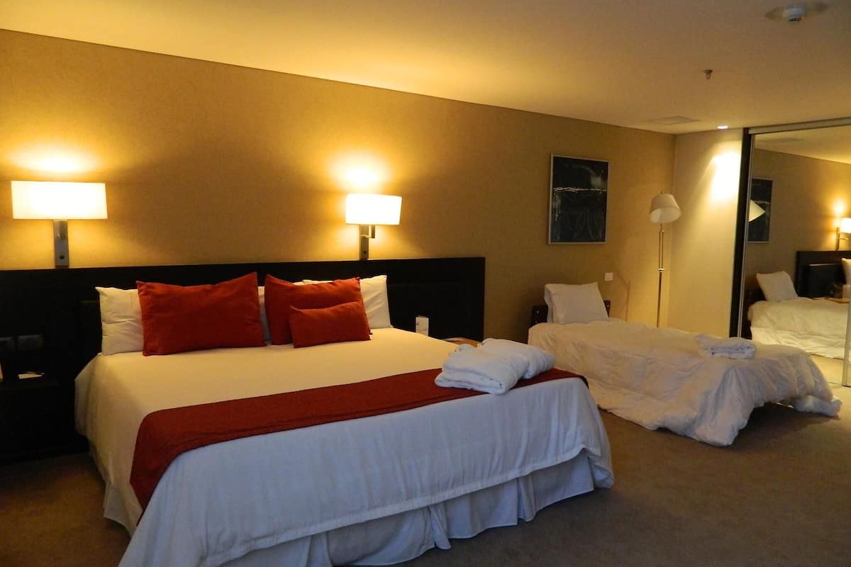 Egyptian cotton sheets, premium bedding, down duvets, minibar