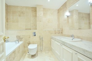 Classic Apartment, 2 Queen Beds, Non Smoking, City View | Bathroom | Deep-soaking bathtub, hair dryer, towels