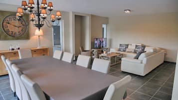 Comfort House, 4 Bedrooms | Living area | Flat-screen TV, video-game console