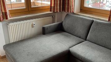 Apartment, Multiple Beds (25) | Living area | Flat-screen TV