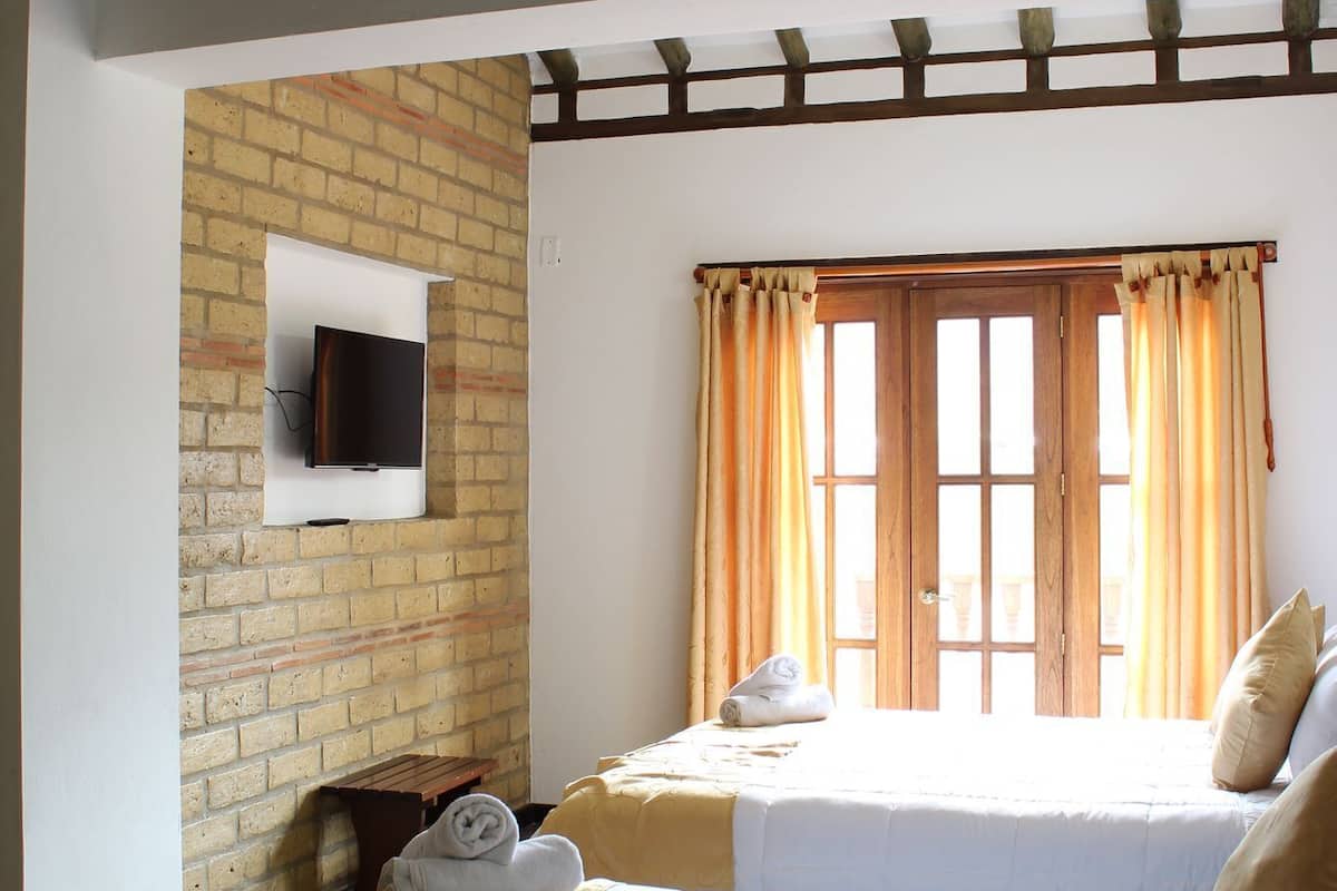 family quadruple room, 2 queen beds, non smoking | 1 bedroom, premium bedding, desk, iron/ironing board