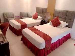 Deluxe Quadruple Room, 2 Bedrooms, Smoking, City View | Pillowtop beds, in-room safe, desk, blackout drapes - Cox's Inn (Cox's Bazar)