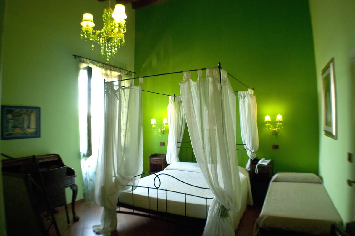 Chambre Triple Confort, balcon, vue jardin