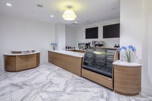 Daily buffet breakfast (USD 30 per person)