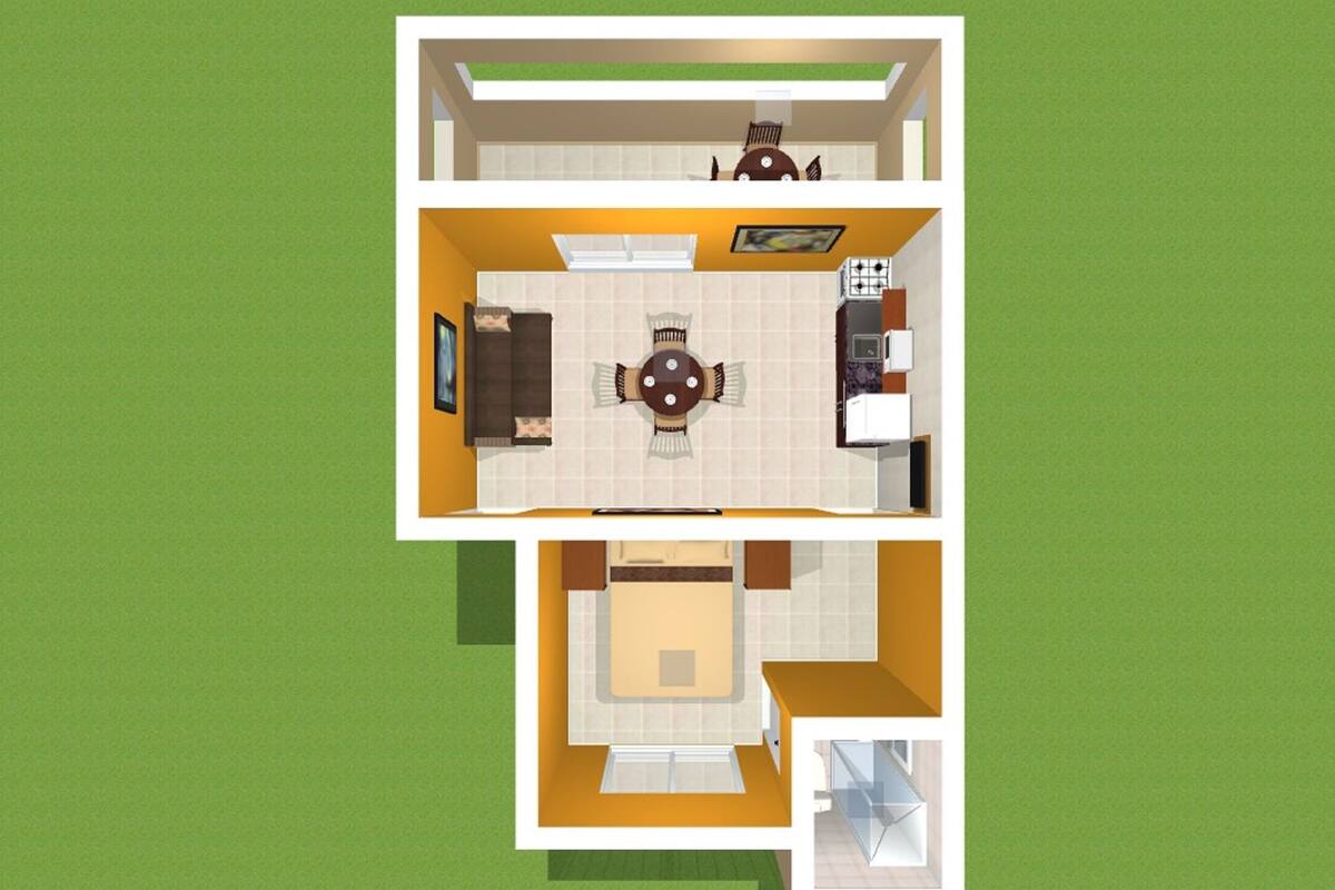 A two-story house layout with a dining area, kitchen, and a bedroom.