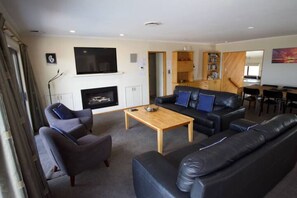 Smart TV, fireplace, DVD player, foosball
