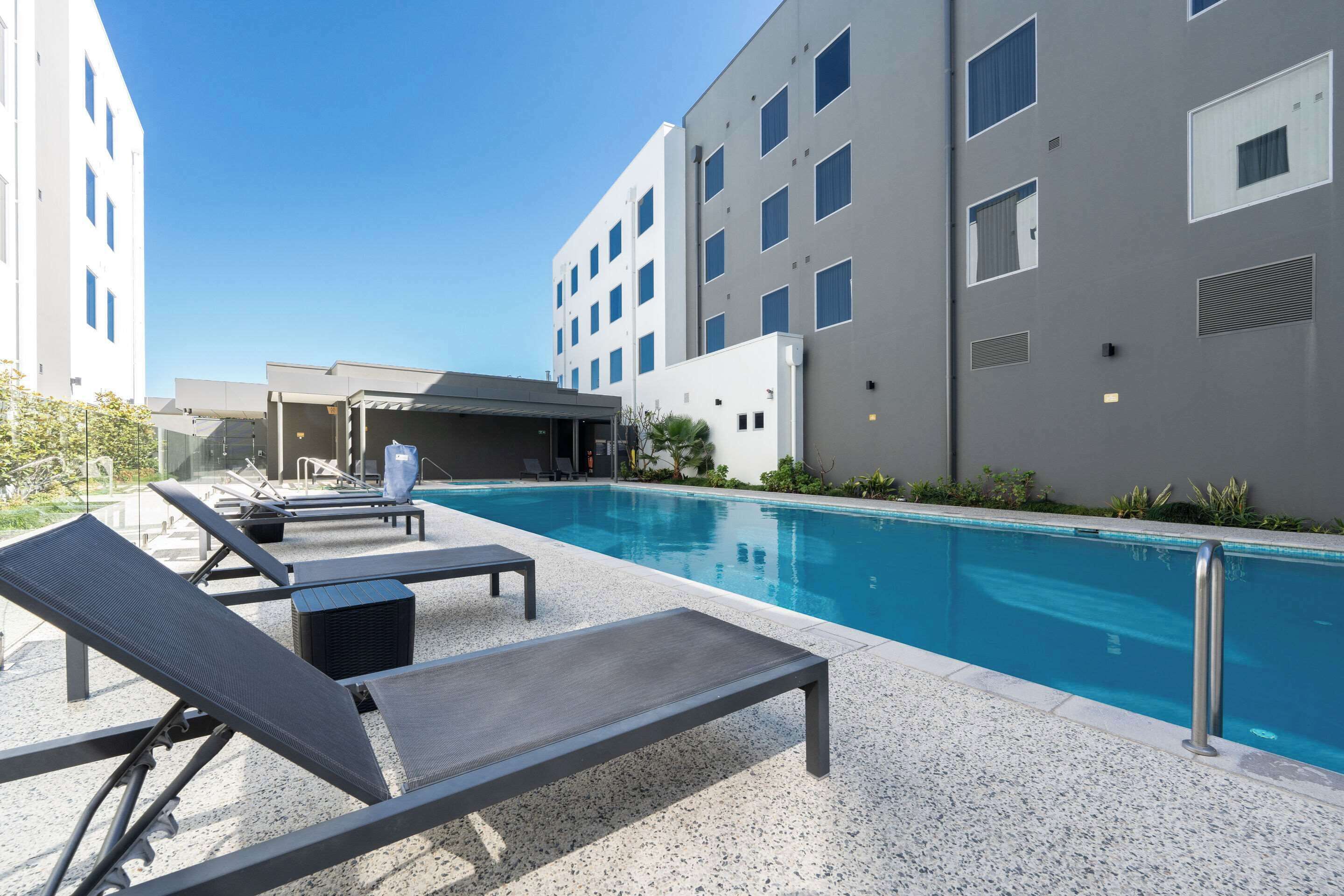 outdoor pool, pool loungers