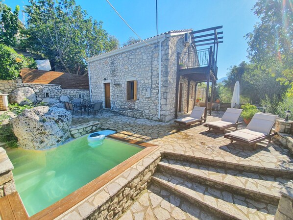 Seasonal outdoor pool, pool umbrellas, pool loungers