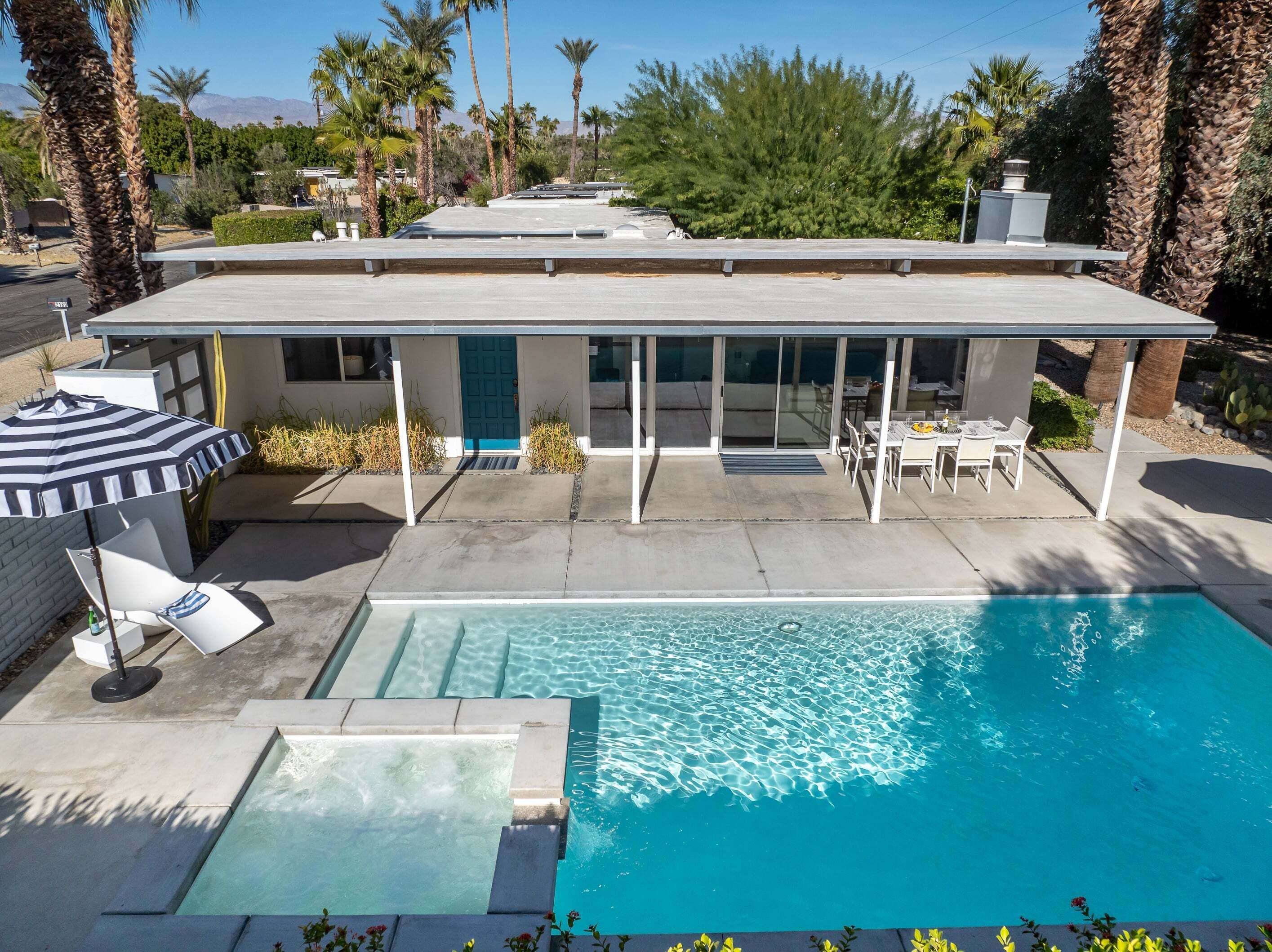 A heated pool, pool loungers