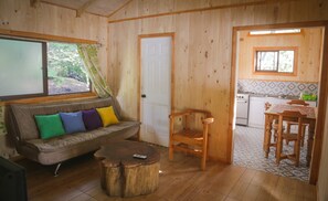 Economy Cabin, 2 Bedrooms, Kitchenette (1 Queen and 2 Single Beds ) | Living area