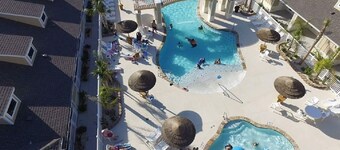  Village by the Beach!Townhome Walking distance to the BEACH, Heated Resort Pool