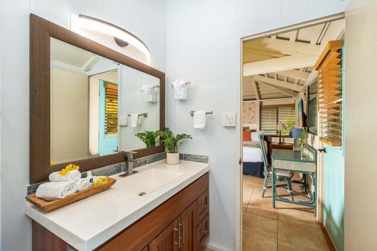 Start your day at this elegant vanity with plenty of counter space