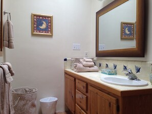 Combined shower/tub, hair dryer, towels, soap