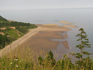 Na praia, toalhas de praia