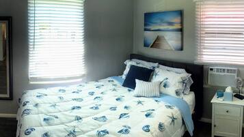 2 habitaciones, tabla de planchar con plancha y cuna de viaje