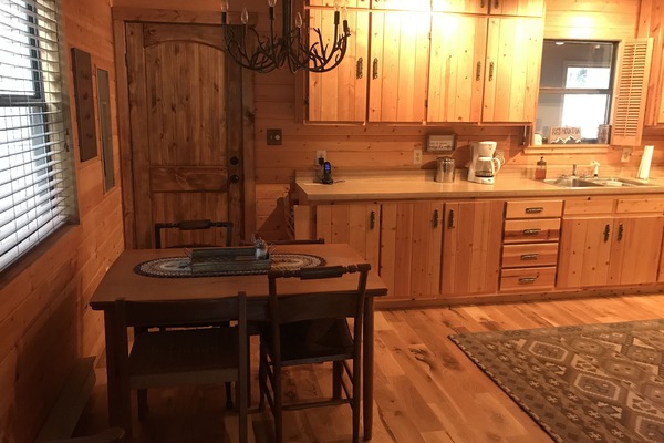 Kitchen with everything you will need to cook home cooked meal and dining area