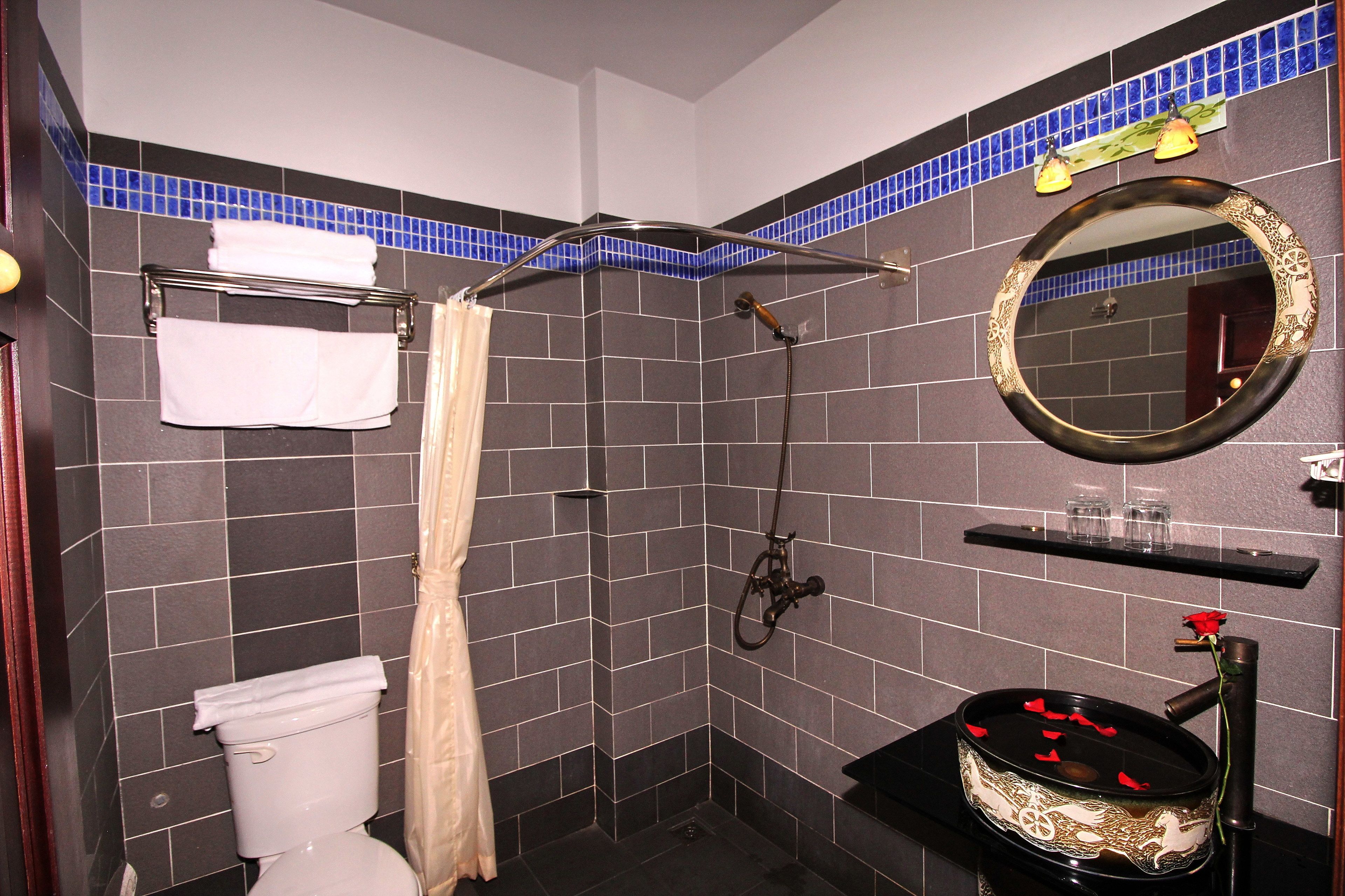 shower, free toiletries, hair dryer, slippers